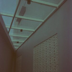 a long hallway with a skylight above it